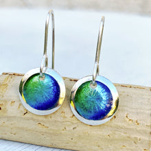 Load image into Gallery viewer, Mixed blues and greens fine silver starburst enamel earrings, 1/2" round with silver rims