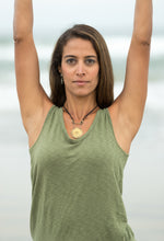 Load image into Gallery viewer, yoga model wearing gong necklace at beach