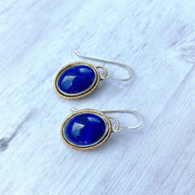Load image into Gallery viewer, Lapis lazuli gold rimmed oval earrings